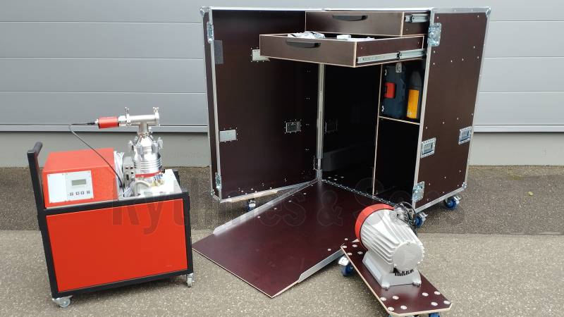 Armoire de transport pour un groupe de pompe à vide de laboratoire